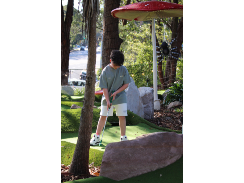 Players putting on the mini golf course at City Golf Gordon